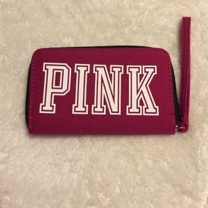 Nwot!! Never used iPhone 5/5s PINK wristlet.