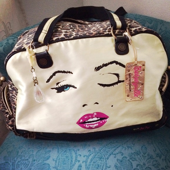 Betsey Johnson overnight duffel bag cheetah print