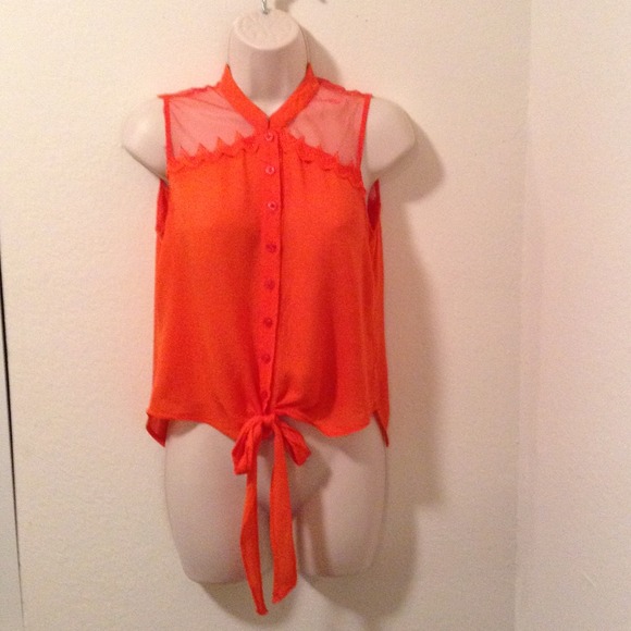 Bright orange top