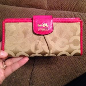 Brown and coral coach wallet