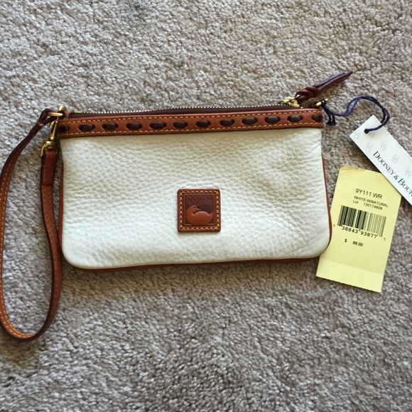 White leather Dooney and Bourke wristlet