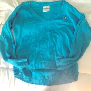 It's a baby blue sweater that's super soft.