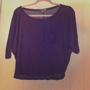 This black loose shirt is the perfect fitting top