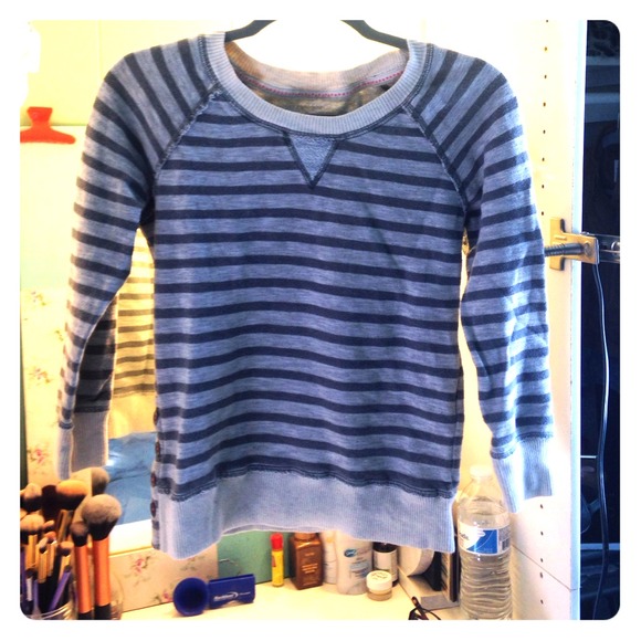 A gray and white striped sweater