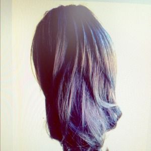 Pony tail clip on dark brown curly