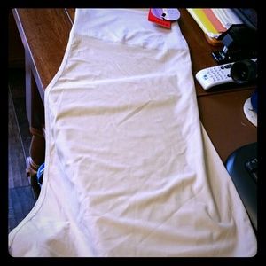 Spanx nude body slip size medium. New with tags
