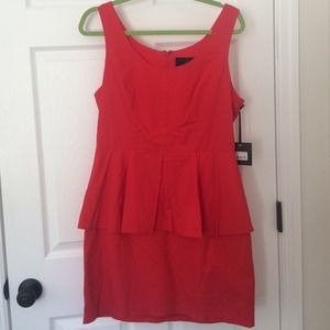 Fun and flirty red peplum party dress 💃