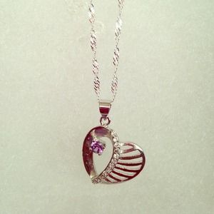 💥SOLD💥1/4ct purple CZ sterling pendant/necklace.