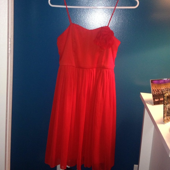 Bright red dress with flower accent
