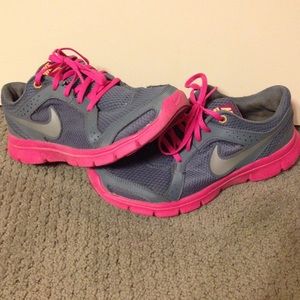 Nike pink and gray running shoes