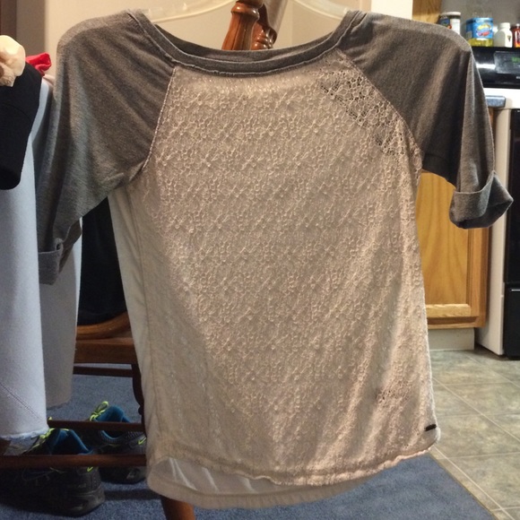 Grey and white lace half length shirt