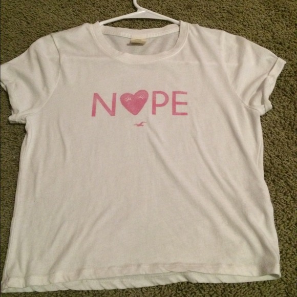 A pink and white Hollister t-shirt