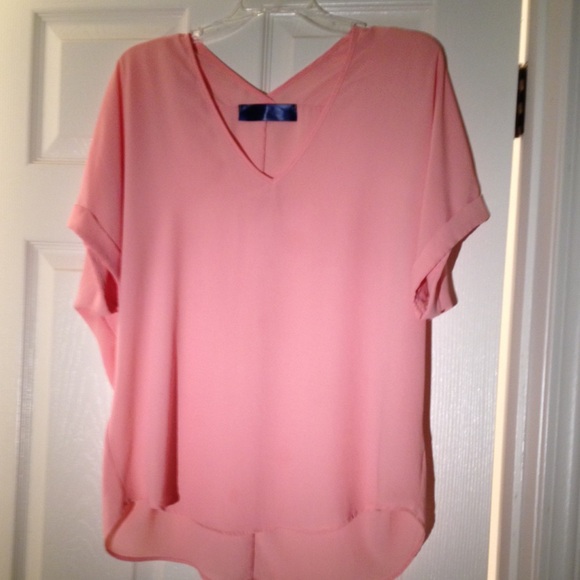 Peach top, relaxed slouchy fit size M
