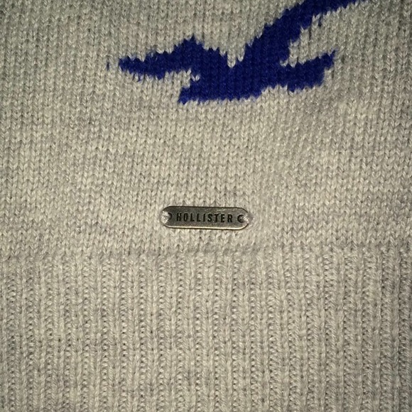 Light grey sweater with blue birds