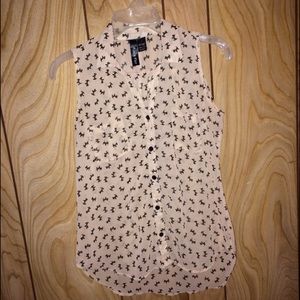 Sleeveless button up shirt