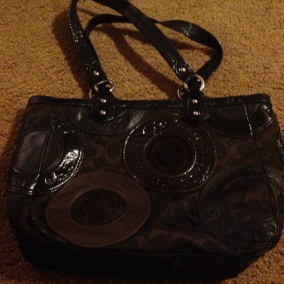 Barely used brown signature coach bag