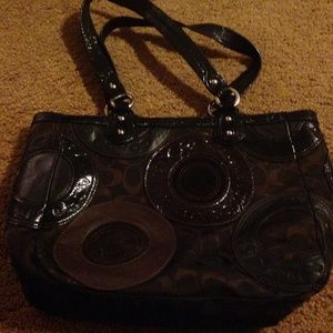 Barely used brown signature coach bag