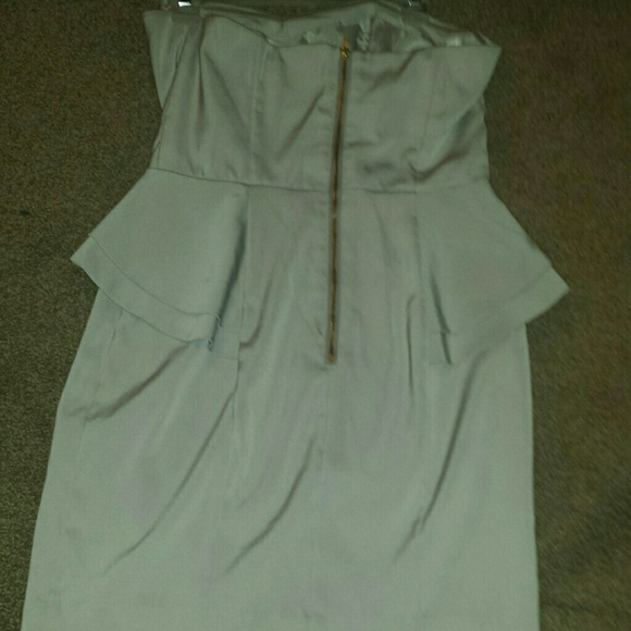 White peplum style dress. - Picture 2 of 3