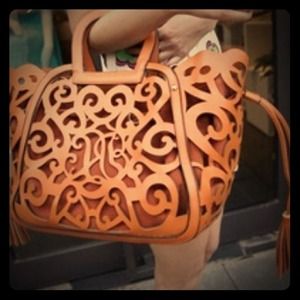 Brown cutout handbag