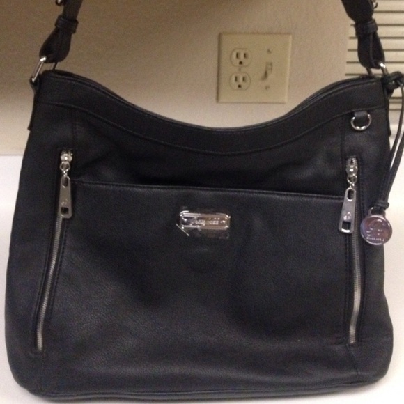 Brand new gun carrying purse never used