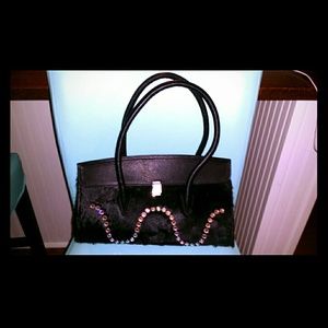 Handbag Never Carried