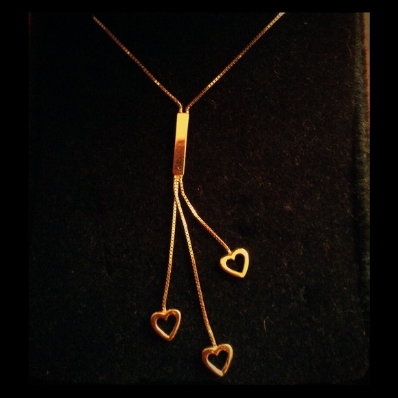Gold necklace with hearts