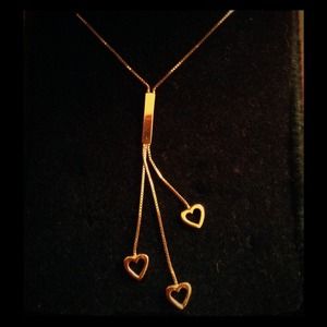 Gold necklace with hearts
