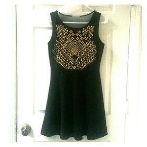 NWOT Sleek black dress with gold studding design