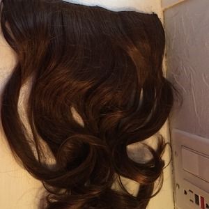 Medium brown clip in hair extension