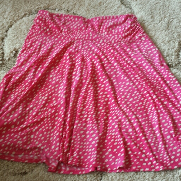 Sold in bundle.  uchsia and white skirt
