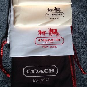 Coach and Michael Kors dust bags.