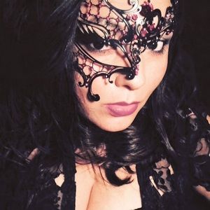 Black mask with red gems