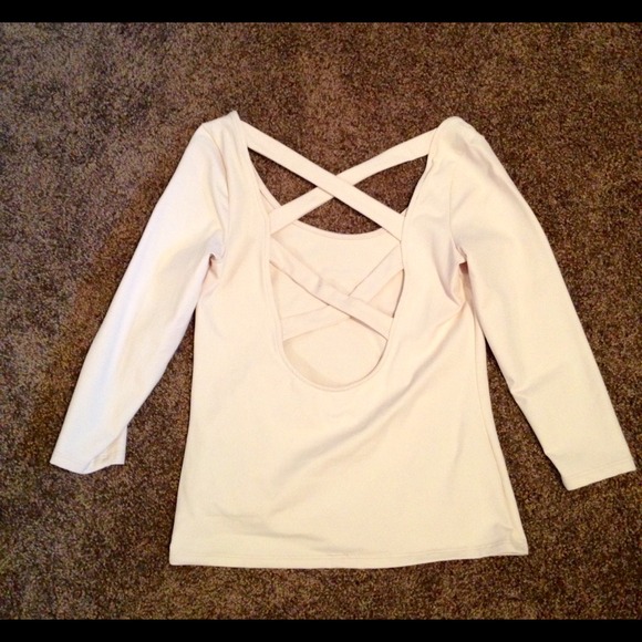 bebe backless top in cream.