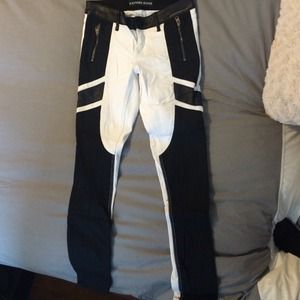 Black and white, leather and zipper detailed jeans