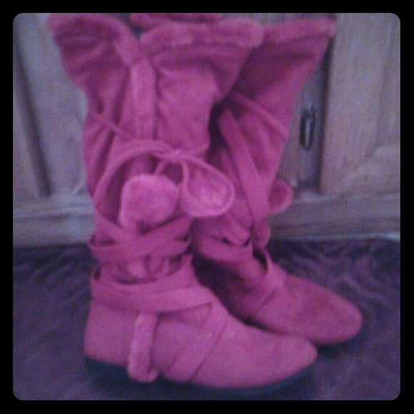 Tall red fuzzy boots