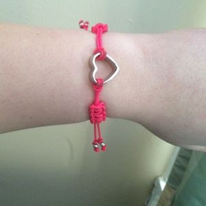 Hot pink Juicy Couture bracelet.