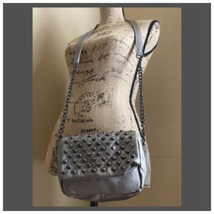 Cross body pewter from Steve Madden .