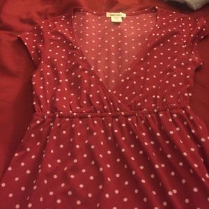 Knee length red pokadot dress