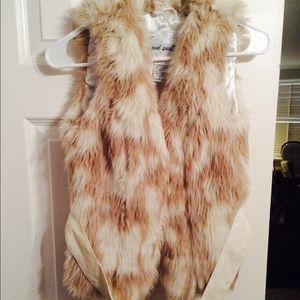 Wet seal fur vest