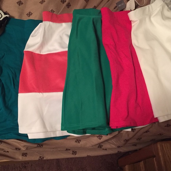 5 skater skirts and a black and white overall