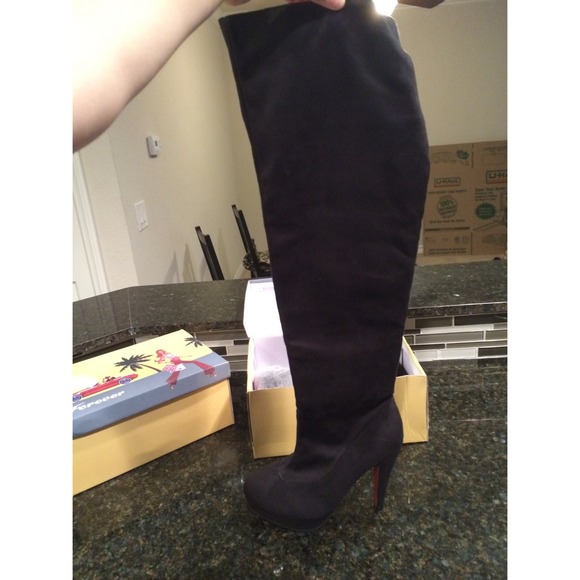 Black faux fur over the knee boots