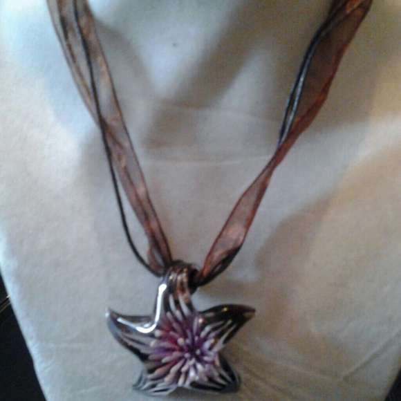 Jewelry - 16 in.  Brown ribbon necklace with glass charm