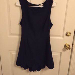 Scalloped romper with cut out back