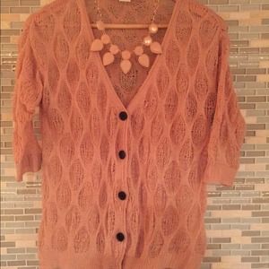 See through pink sweater