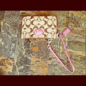 Authentic Coach corner zip wristlet