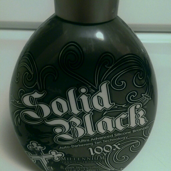 NEW - Solid Black tanning lotion