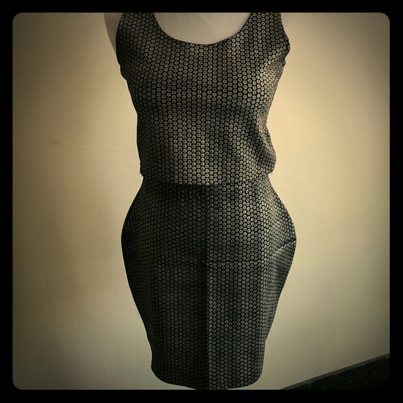 2 piece. Silver and black outfit skirt is fitted