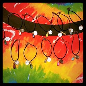 1 handcrafted horoscope/wishbottle charm bracelet.