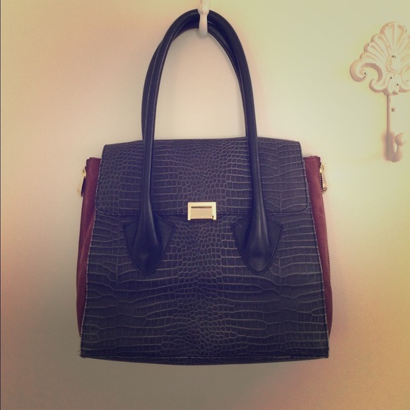 Pour La Victoire Handbag