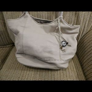 The Sak cream leather purse.